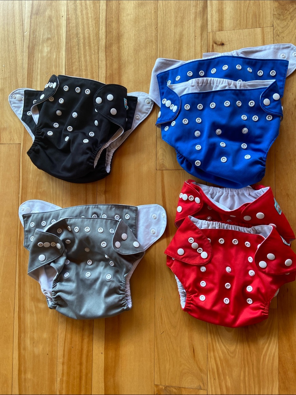 8 Alva Baby Cloth Diaper Covers and 14 inserts - Black, Blue, Gray, Red.